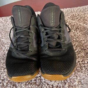 Nike reaction black and gold